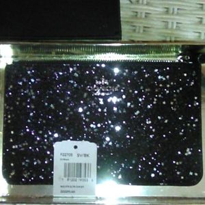 BOXED SMALL WRISTLET WITH GLITTER STAR COACH.